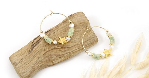 Golden hoop earrings with starfish motif, freshwater pearls and green heishi Golden hoop earrings with starfish motif, freshwater pearls and green heishi