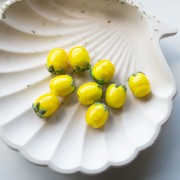 Lemon bead 13x11 mm in glass - Yellow - Green leaf x1