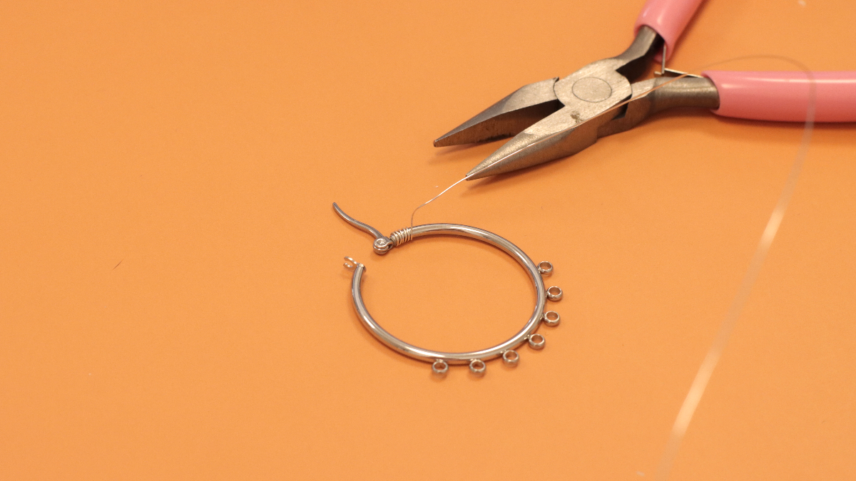 Silver wire wrapping hoop earrings and gemstone charms : Step 2 Silver wire wrapping hoop earrings and gemstone charms : Step 2