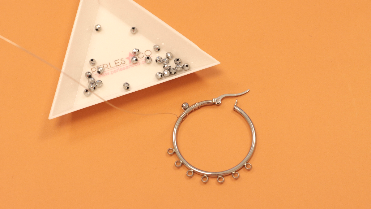 Silver wire wrapping hoop earrings and gemstone charms : Step 3 Silver wire wrapping hoop earrings and gemstone charms : Step 3