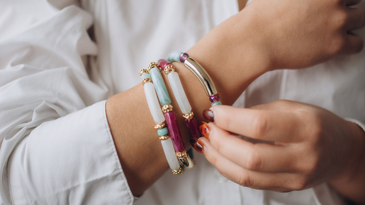 Elastic bracelets beads green and purple tubes Elastic bracelets beads green and purple tubes