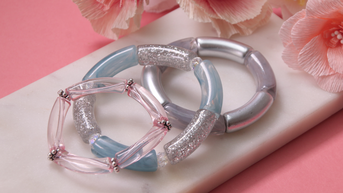 Elastic bracelets in silver tubes Elastic bracelets in silver tubes