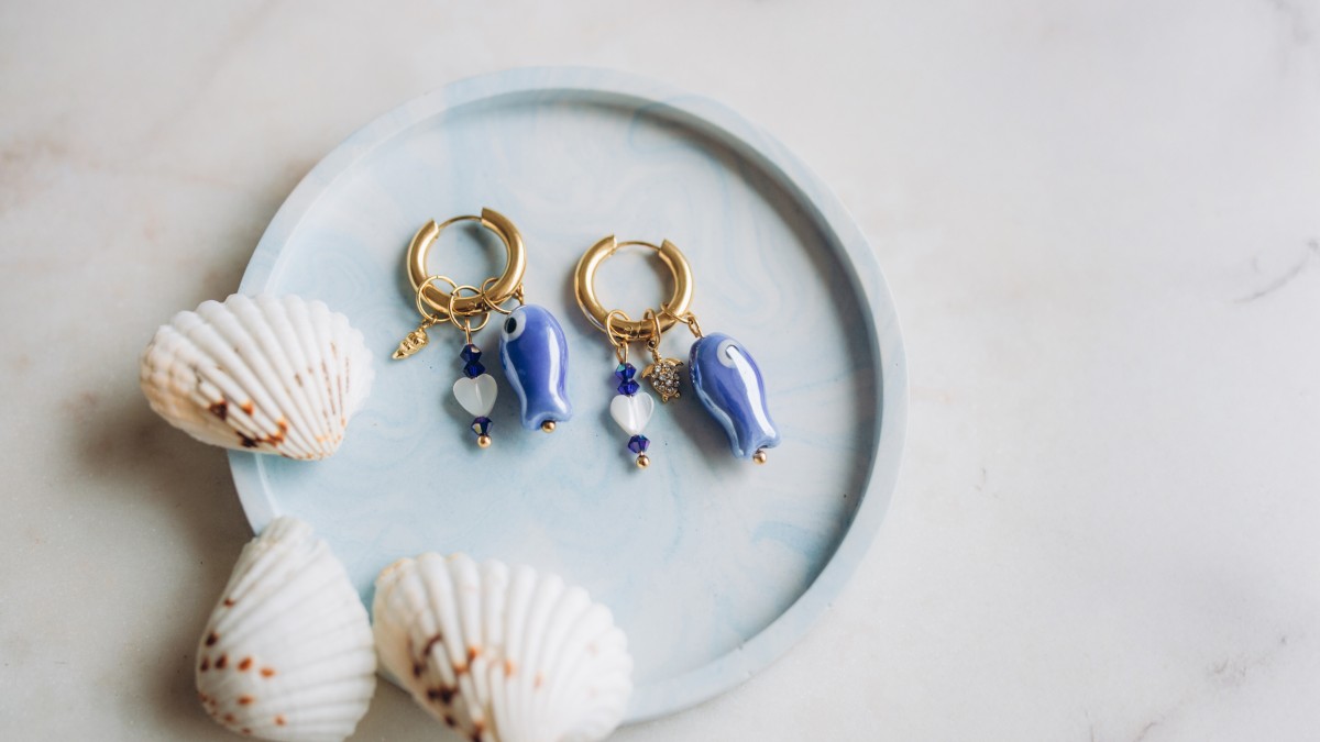 Creole earrings with fish pendant Creole earrings with fish pendant