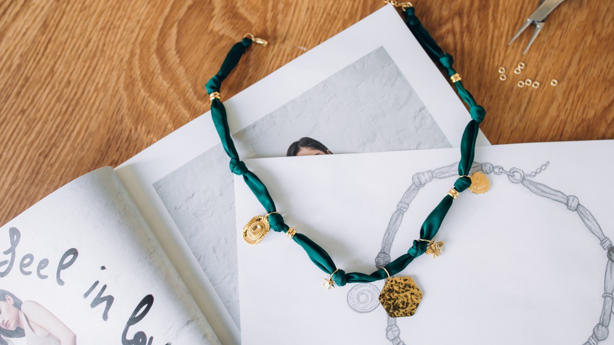 Forest green fabric choker with gold charms Forest green fabric choker with gold charms