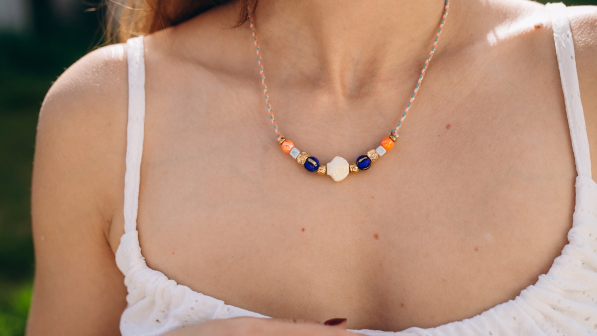Cord necklace with multicolored beads Cord necklace with multicolored beads