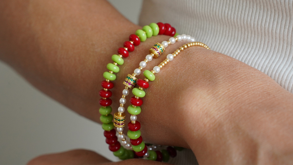 Set of three bracelets made with Heishi beads and gold-colored Miyuki seed beads Set of three bracelets made with Heishi beads and gold-colored Miyuki seed beads